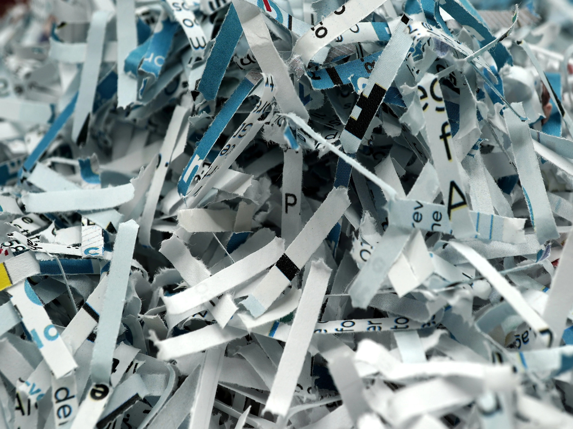 Close-up of shredded office documents.
