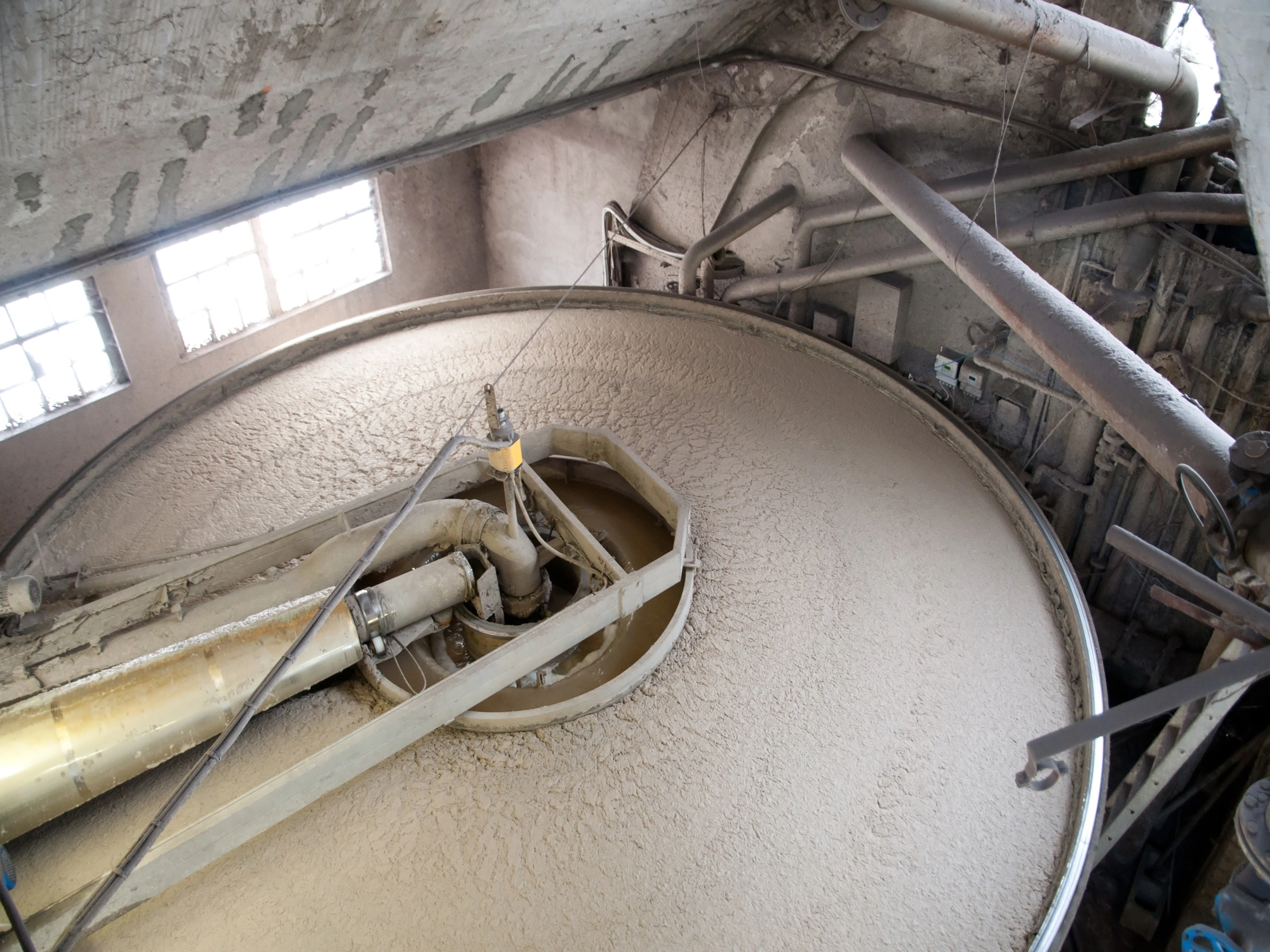 Paper mill factory processing paper into pulp.
