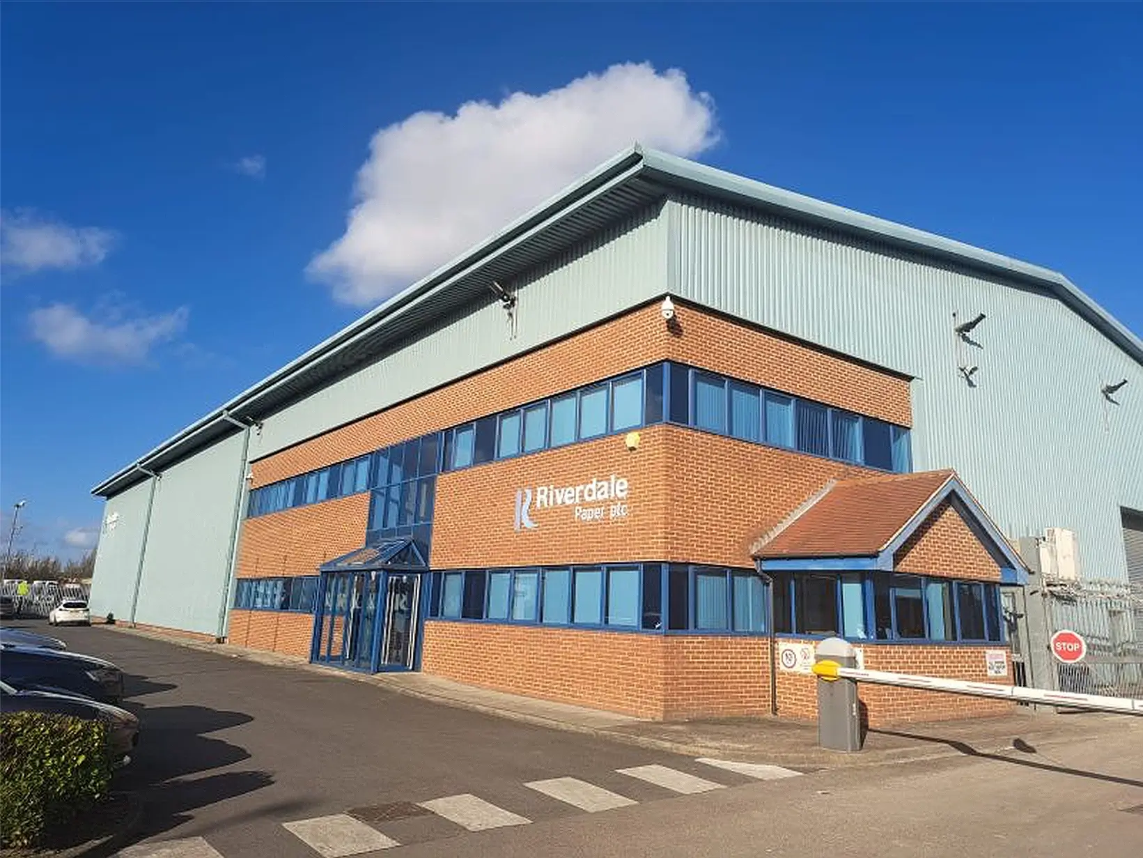 the Riverdale head office on a sunny day.