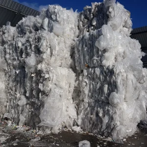 Tall stacks of baled polythene packaging photographed at Riverdale Recycling site.